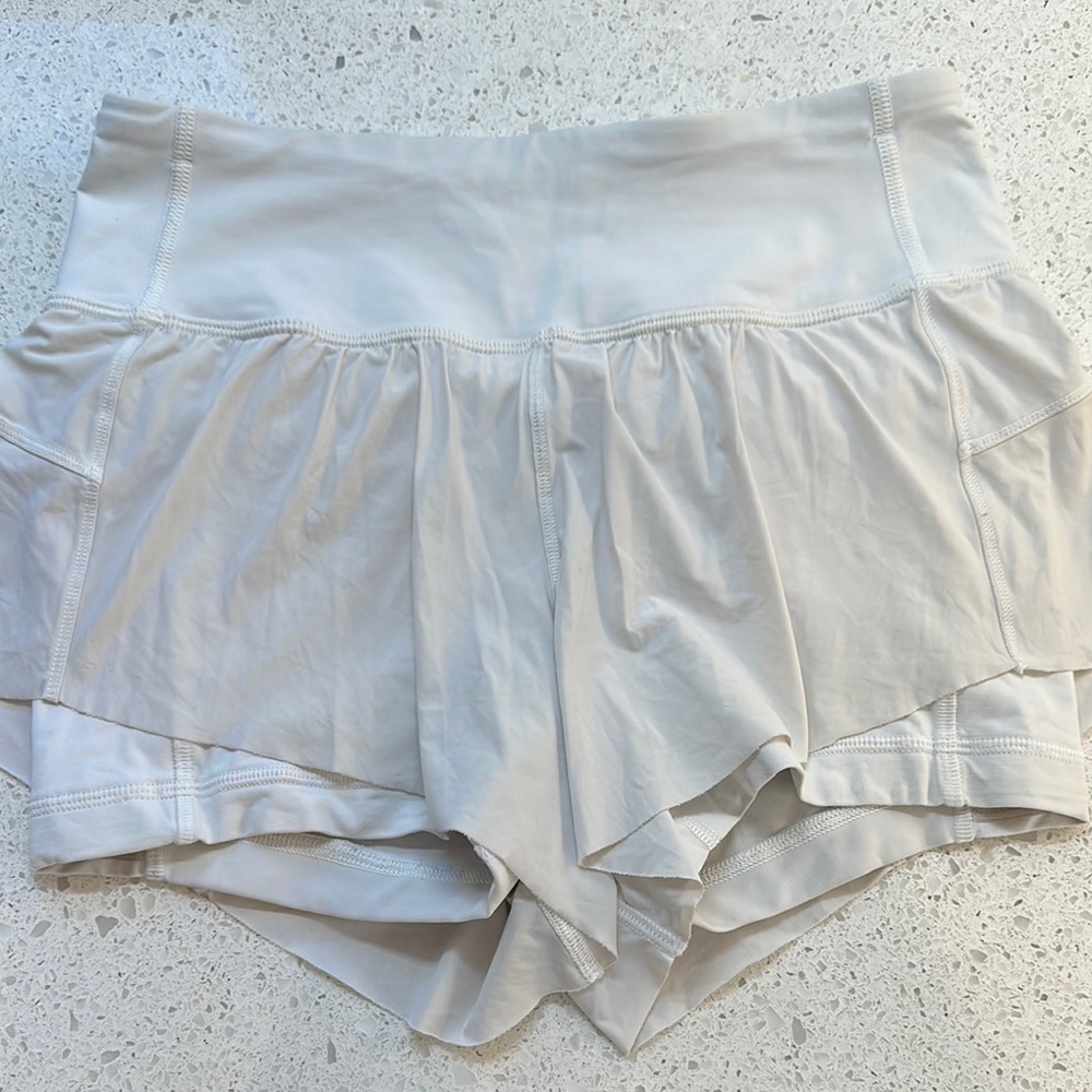 Women's Lululemon White Athletic Shorts. Size 4 regular.